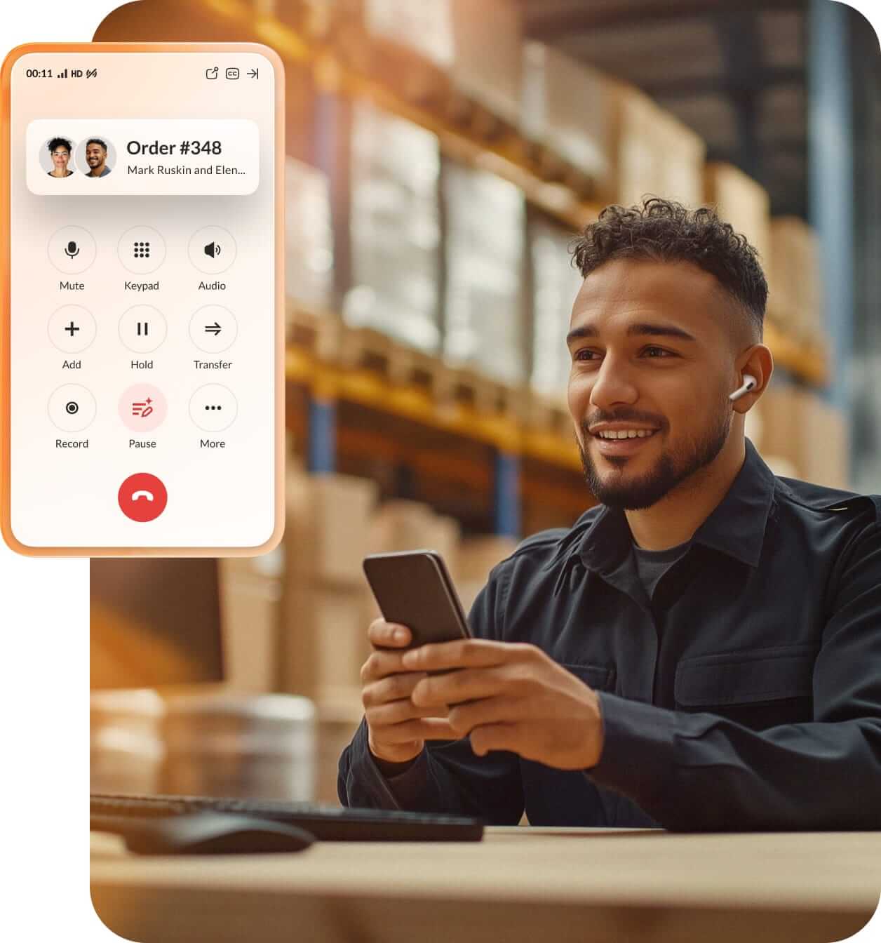 A male warehouse working engaged in a call between coworkers using the RingCentral app on his mobile phone